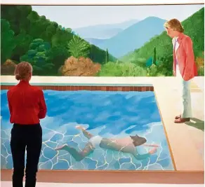  ??  ?? A woman looks at David Hockney’s Portrait Of An Artist (Pool With Two Figures) during a press preview at Christie’s New York. The painting is to be auctioned during Christie’s November 2018 Evening Sale of Post-War and Contempora­ry Art. — AFP