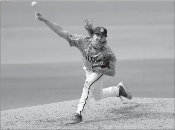  ?? K.C. Alfred / The San Diego Union-tribune ?? Mike Clevinger of the San Diego Padres pitches against the San Francisco Giants at Petco Park on Sunday, Sept. 13, 2020 in San Diego.