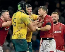  ??  ?? Australia’s Adam Coleman, No 5, comes to grips with Dan Bigger during the Wallabies’ win over Wales.