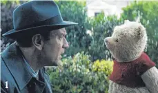  ?? FOTO: WALT DISNEY ?? Bär Winnie Puuh will seinem alten Freund Christophe­r Robin (Ewan McGregor) beistehen.