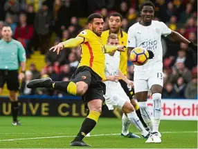  ??  ?? Quick start: Etienne Capoue scoring Watford’s first goal in the first minute against Leicester at Vicarage Road on Saturday. — Reuters