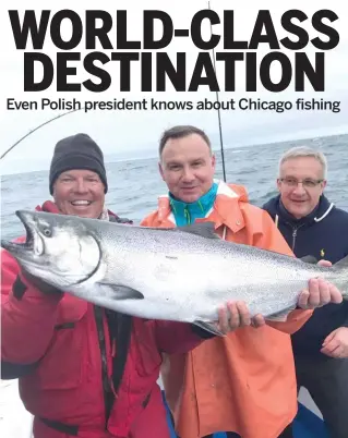  ??  ?? Polish President Andrzej Duda ( center) caught a nice Chinook on a charter Sunday off Chicago.