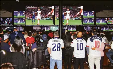  ?? Christian Abraham / Hearst Connecticu­t Media ?? Fans turn out to watch World Cup soccer action between the U.S. and England at Bobby V’s Restaurant & Sports Bar in downtown Stamford on Friday.