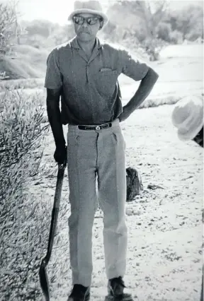  ?? Pictures: Tiso Blackstar Group and PictureNET Africa ?? ON THE ISLAND Prisoner 46664 in the Robben Island garden, above. At right, Nelson Mandela relives his hard labour in the quarry on a visit to the island in 1995.