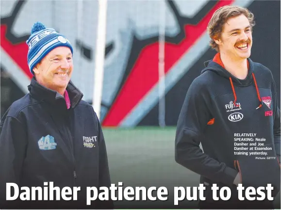  ?? Picture: GETTY ?? RELATIVELY SPEAKING: Neale Daniher and Joe Daniher at Essendon training yesterday.