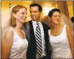  ?? ASSOCIATED PRESS ARCHIVES ?? Then San Francisco Mayor Gavin Newsom stands between newlyweds Cissie Bonini, left, and Lora Pertle at San Francisco City Hall in 2004.