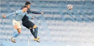  ?? JON SUPER THE ASSOCIATED PRESS ?? Manchester City’s Phil Foden, left, battles with Marseille’s Hiroki Sakai on Wednesday.