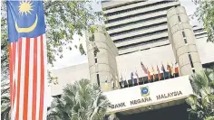  ??  ?? BNM expects the country’s economic prospects to remain firm next year, and grow at 4.9 per cent, underpinne­d by continuous private sector activities, says its Governor. — AFP photo