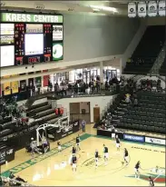  ??  ?? Green Bay Phoenix warm-up with band to the left, shop sells items on the balcony, just inside glass entrance.