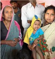  ?? — PTI ?? Lance Naik Hanumantha­ppa Koppad’s mother and wife at their home at Betadoor village in Hubli, Karnataka, on Tuesday.