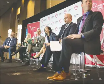  ?? PETER J. THOMPSON ?? A panel of experts join the outlook luncheon Tuesday held by the National Post and the Canadian Club of Toronto. From left, JF Perrault of Scotiabank, Shauna Sexsmith of Manulife, Kevin Carmichael of Financial Post, Amanda Lang of BNN Bloomberg, Matt Gurney of National Post and moderator Bruce Sellery.