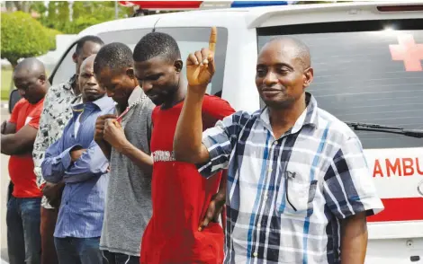  ?? PHOTO: Felix Onigbinde ?? Suspects arrested for the attempted assassinat­ion of Senator Dino Melaye, being paraded at the Police Force Headquarte­rs in Abuja yesterday. On the right is the Chairman Ijumu Local Government Area, Taofiq Isah