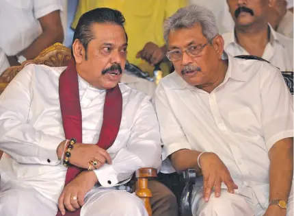  ??  ?? Sri Lankan President Gotabaya Rajapaksa (right) and his brother Mahinda Rajapaksa.