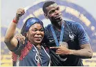  ??  ?? MA OF THE MATCH Pogba &amp; mum Yeo