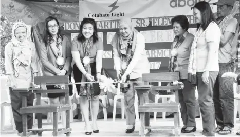  ??  ?? QUALITY EDUCATION. Cotabato Light and Power Company donated 235 new armchairs, desks and chairs to the remote Don Antonio Martinez Sr. Elementary School (DAMSES) in Maguindana­o Province.