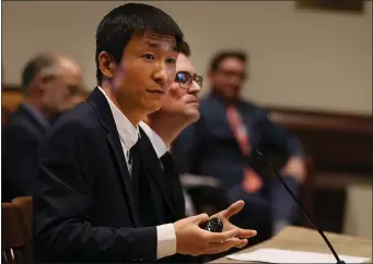  ?? NANCY LANE — BOSTON HERALD ?? Zirui Song, director of research at the Harvard Medical School for Primary Care, testifies Monday before the Joint Committee on Health Care Financing.