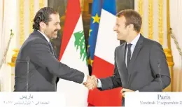  ?? AFP ?? HARIRI Y Macron, durante una reunión en 2012