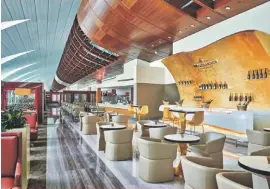  ??  ?? Customers needing to unwind before their flight can look forward to the Moët & Chandon champagne lounge created exclusivel­y for Emirates