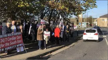  ??  ?? A protest surroundin­g cardiac care at University Hospital Waterford in November.