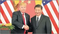  ??  ?? TESIS Y ANTITESIS. El abrazo de Fernández a Macri y las negociacio­nes entre Trump y Xi Jinping en Bs. As.