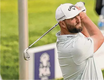  ?? Eric Gay/Associated Press ?? Jon Rahm, of Spain, works at the range during a practice round for the PGA Championsh­ip golf tournament Tuesday at Oak Hill Country Club in Rochester, New York.