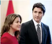  ??  ?? JUSTIN TRUDEAU AND HIS WIFE SOPHIE: She takes the COVID hit while he is quarantine­d for two weeks