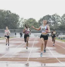  ?? ?? Sadie Blake wins the under-20 women’s 200m