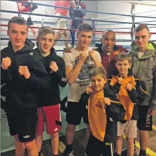  ??  ?? Young Lochaber boxers are, back row, left to right, Robert MacDonald, Cameron Whyte, Shaun Wallace and, far right, Ross MacConnell; and, front row, left to right, Max Derbenovs and Josh Dieguno with, back row, second from right, Junior Witter, who has...
