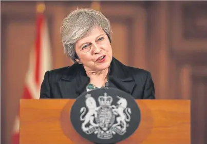  ??  ?? PRESSURE: Prime Minister Theresa May holds a press conference at 10 Downing Street, London