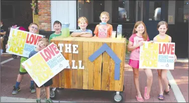  ?? News-Times, File ?? A Good Cause: Five local youth raise money for The CALL in Union County with a lemonade stand downtown. The mission of The CALL is to educate, equip, and encourage the Christian community to provide a future and a hope for children in foster care in Arkansas. For more informatio­n, visit thecallina­rkansas.org.