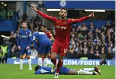  ?? EPA ?? Wolverhamp­ton Wanderers’ Matheus Cunha celebrates scoring against Chelsea at Stamford Bridge yesterday