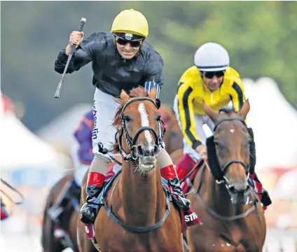  ??  ?? Up and running: Stradivari­us, ridden by Andrea Atzeni, wins his first Goodwood Cup in 2017