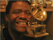  ?? Picture: Sandile Ndlovu ?? THE PAST: Ladysmith Black Mambazo founder, Joseph Shabalala, poses with one of the group’s Grammy Awards.