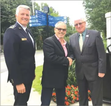  ?? TBL WEBSITE ?? Left to right: Bromont Police Chief Jean Bourgeois, Bromont Mayor Louis Villeneuve, and TBL Mayor Richard Burcombe