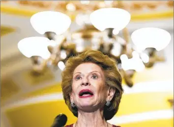  ?? Mariam Zuhaib Associated Press ?? SEN. Debbie Stabenow (D-Mich.) responded to Republican members in a committee hearing upset by the increased spending for U.S. food programs. “The average benefit is only about $6 per person per day,” she said.