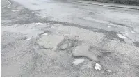  ??  ?? ●● Potholes near the junction of Fallbarn Crescent with Lomas Lane (above) and (below) the junction of Bury Road and Hall Carr Lane.