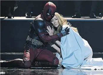  ?? 20TH CENTURY FOX ?? Dancer and big Celine Dion fan Yanis Marshall — as foul-mouthed superhero Deadpool — performs with Dion for the Ashes video.