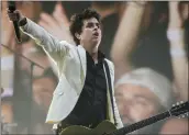  ?? TIMOTHY HIATT — GETTY IMAGES ?? Billie Joe Armstrong of Green Day performs at Wrigley Field in August 2021in Chicago.