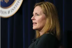  ?? Photograph: Damian Dovarganes/AP ?? Amy Coney Barrett.