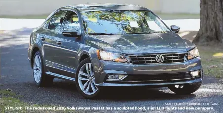  ?? STAFF PHOTO BY CHRISTOPHE­R EVANS ?? STYLISH: The redesigned 2016 Volkswagen Passat has a sculpted hood, slim LED lights and new bumpers.