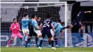  ??  ?? Marquinhos, far right, puts PSG ahead with a glancing header — his fifth goal in his last 12 Champions League games.