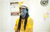  ??  ?? Musician Manasseh Mathiang poses for a portrait in the office of the art group AnaTaban, whose name means ‘I am tired’ in Arabic, in Juba, South Sudan. — Reuters