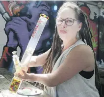  ?? VERONICA HENRI ?? Abi Roach, owner of the Hotbox Cafe in Toronto, is planning a pot-themed hotel room in case consumptio­n is allowed in hotels.