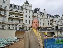  ??  ?? Tycoon: Mr Richardson at the Grand Hotel on Torquay’s seafront