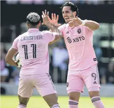  ?? MATIAS J. OCNER mocner@miamiheral­d.com ?? Inter Miami forwards Ariel Lassiter and Leonardo Campana celebrate in the first half after one of Campana’s three goals against the Revolution.