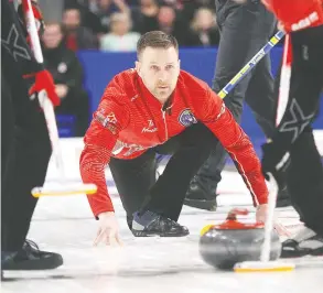  ?? IAN MACALPINE / POSTMEDIA NEWS FILES ?? Newfoundla­nd and Labrador skip Brad Gushue throws a rock against Alberta last
March during the final of the 2020 Tim Hortons Brier.