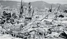  ?? THE ASSOCIATED PRESS FILE ?? This Aug. 6, 1945, photo shows the destructio­n from the explosion of the atomic bomb in Hiroshima, Japan.