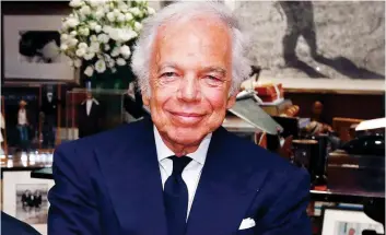  ?? JASON DECROW/AP ?? Designer Ralph Lauren poses in his office in New York. Lauren, one of the giants of modern American fashion, is working on his autobiogra­phy. Simon & Schuster said, Wednesday that it will release the book in the Fall 2017, in conjunctio­n with his...