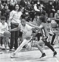  ?? ?? Judson guard Michaela Verrett, left, makes a move on the permieter during Friday’s game against rival Wagner.