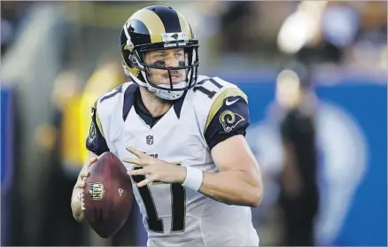  ?? K.C. Alfred San Diego Union-Tribune ?? THE CASE can certainly be made that Case Keenum is the Rams’ best quarterbac­k at the moment, which explains why he’s likely to start the Sept. 12 season opener. But fans have expressed a clear preference, through merchandis­e sales, for top draft pick...